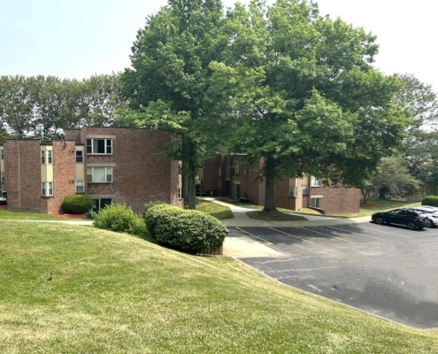 Summit Apartments Exterior Detail with Parking Area